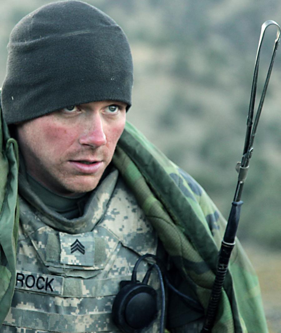 U.S. Army Sgt. <b>Nathan Schrock</b> tries to keep warm after waking up on a cold ... - afpak-fun-03c-24