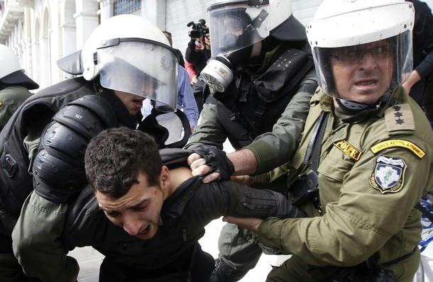 Greek police arresting a demonstrator. (Photo courtesy of Cryptome)