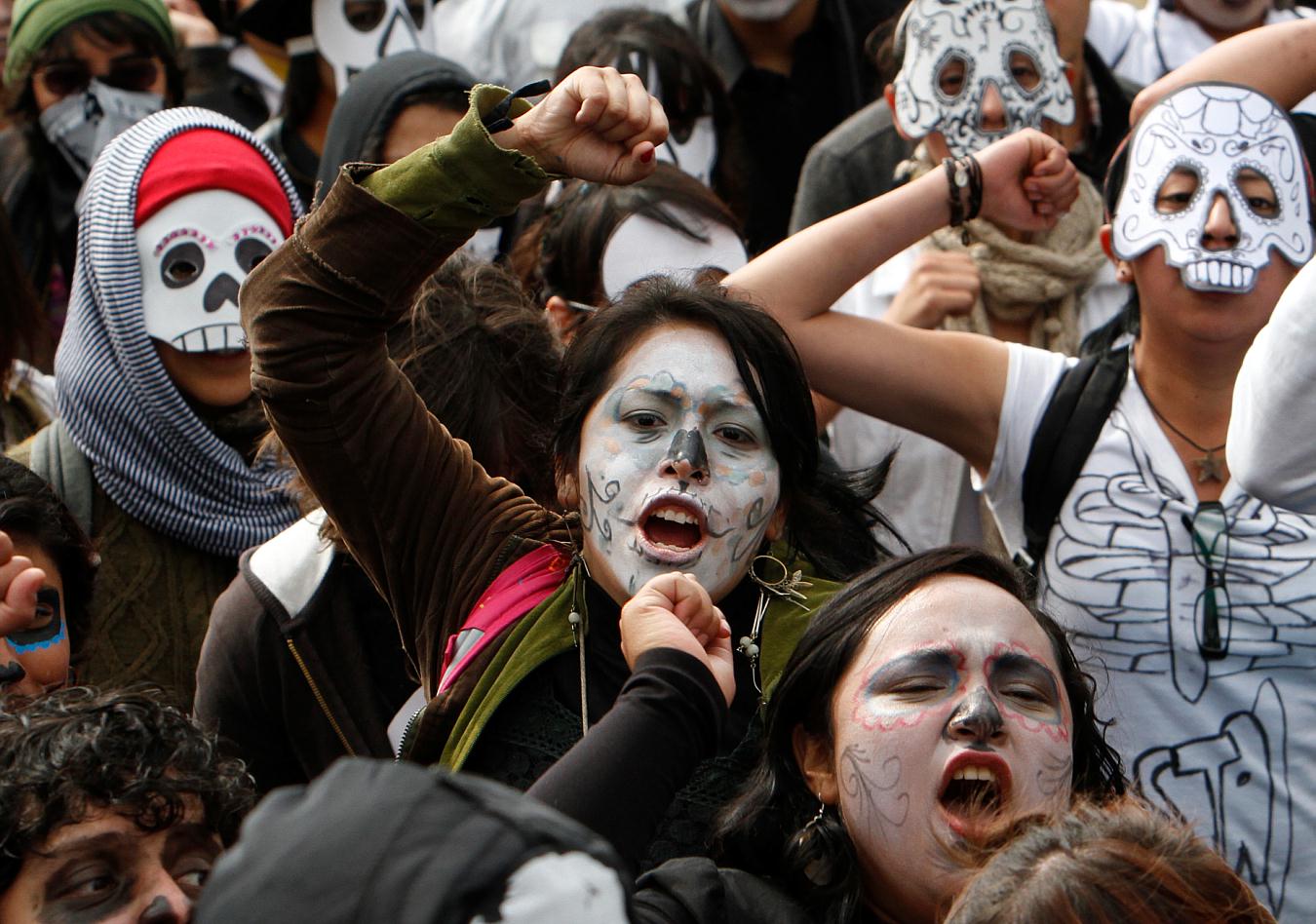 Demonstrators wore skull masks