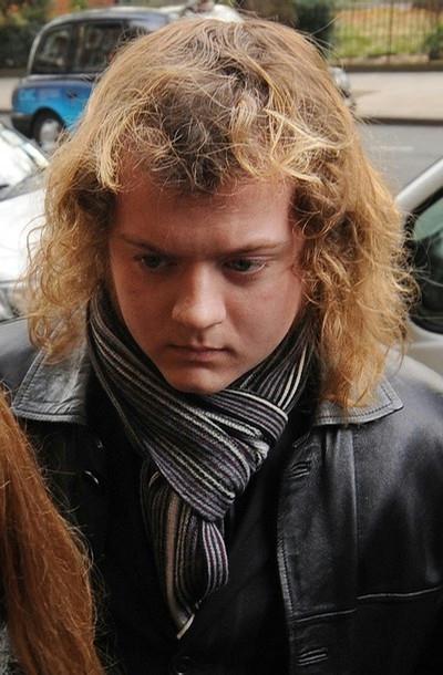 Edward Woollard arrives at Westminster Magistrates court in central London on November 24, 2010. Woollard pleaded guilty Wednesday, to throwing a fire ... - pict45